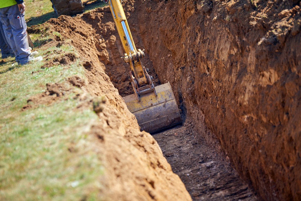 excavation of a trench on a construction site.