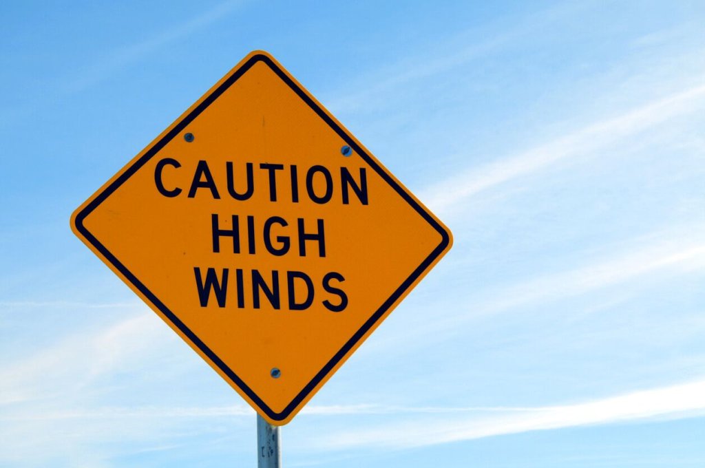 Caution High Winds safety sign.