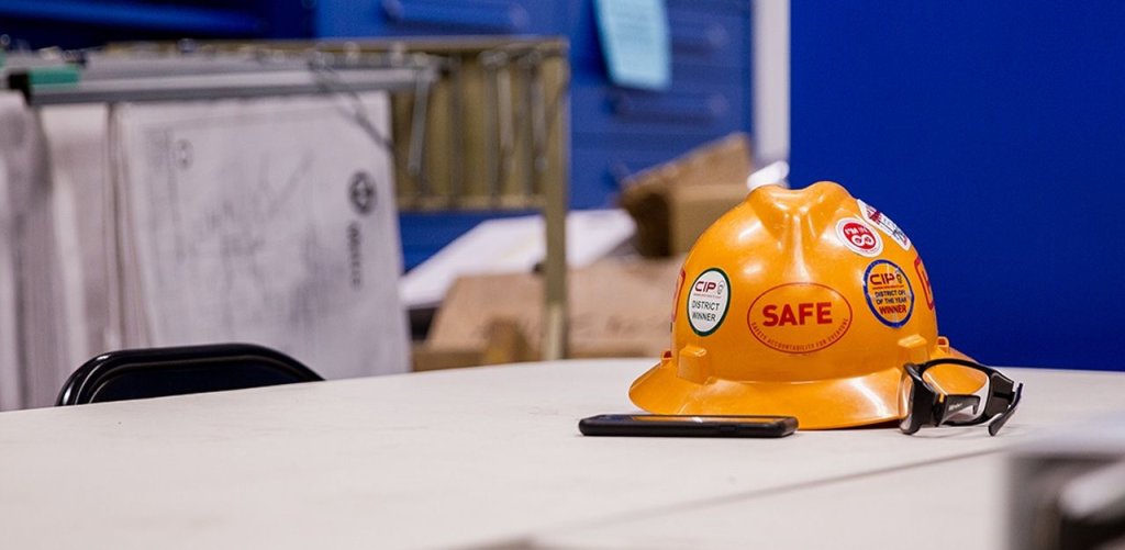 construction hard hat on table.