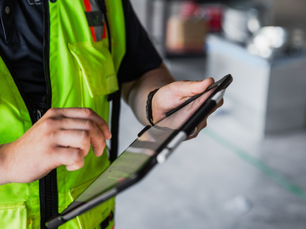 construction worker using iPad.