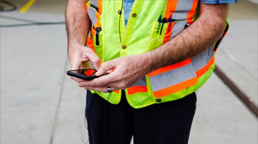 contractor using mobile phone.